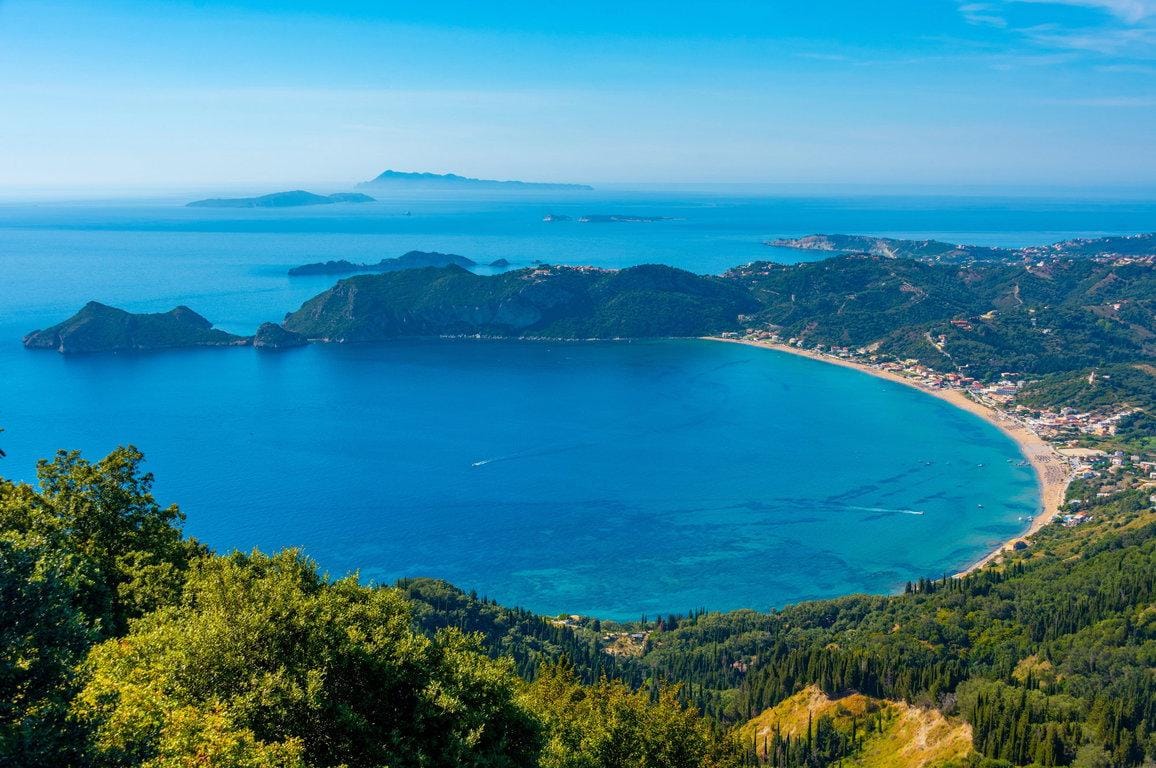Panorama view of Agios Georgios beach in Greek island Corfu Korfu: Agios Georgios Beach